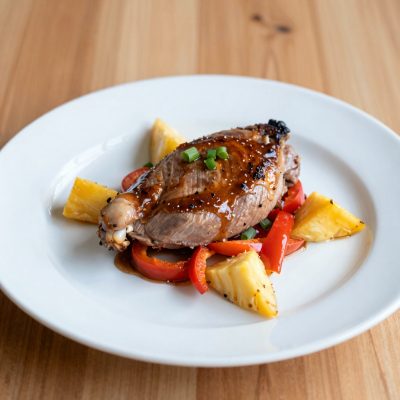 Anatra e frutta in salsa saporita